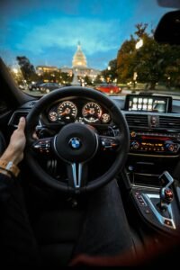 Home View of the Capitol in Washington DC through the BMW steering wheel during a drive.